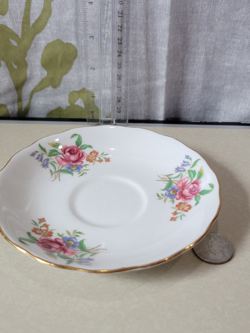White Porcelain Saucer with Pink Floral Motif and Gold Trim